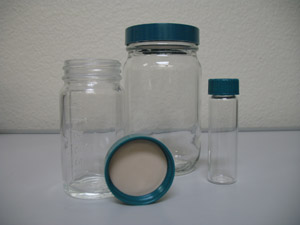 Different sizes of glass jars with Teflon lined lids