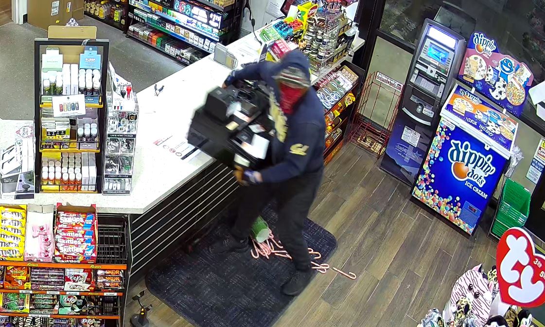 armed-robbery-machete-register.jpg